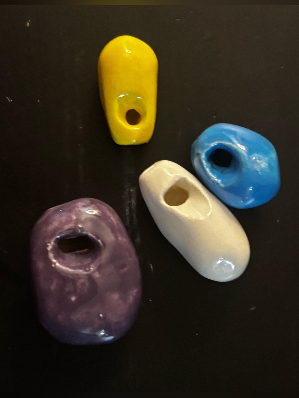 Set of four whistle rocks